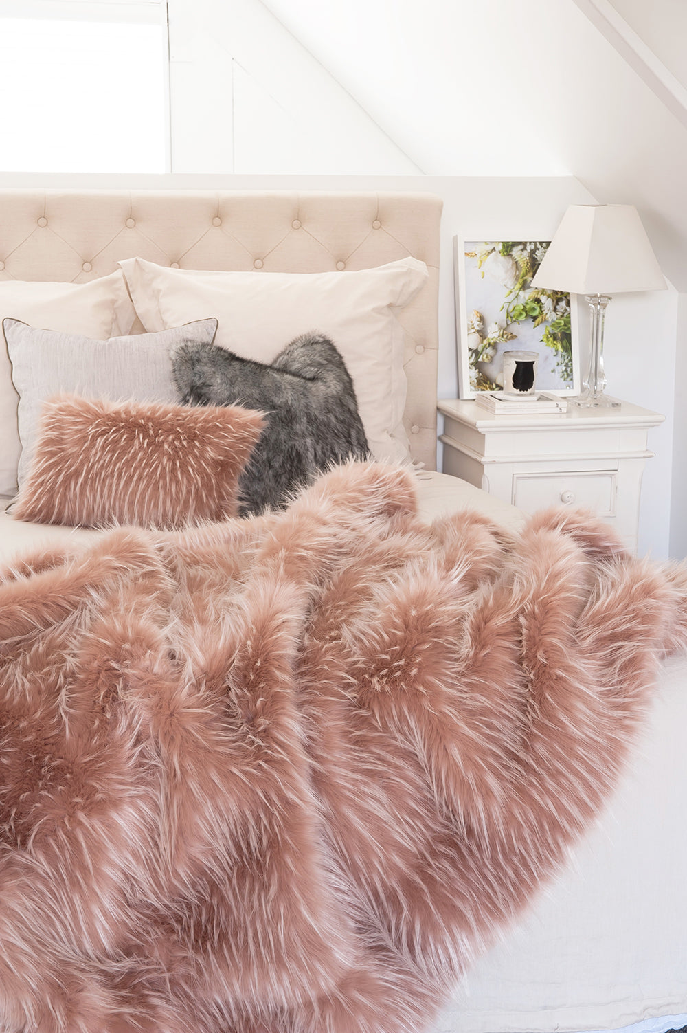 Imitation faux fur cushion in pink Peony Plume by Heirloom, Furtex. Fake fur cushions for New Zealand interiors