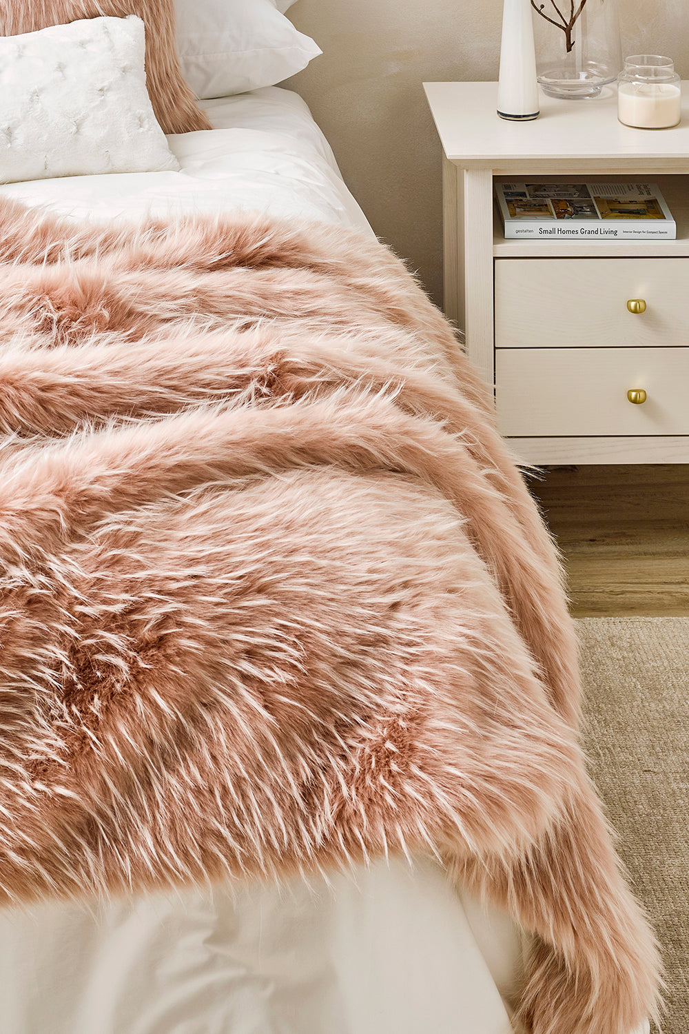 Luxury faux fur throw Peony Plume in pale pink from Heirloom. These are the best fake fur throws, super soft for NZ interior design