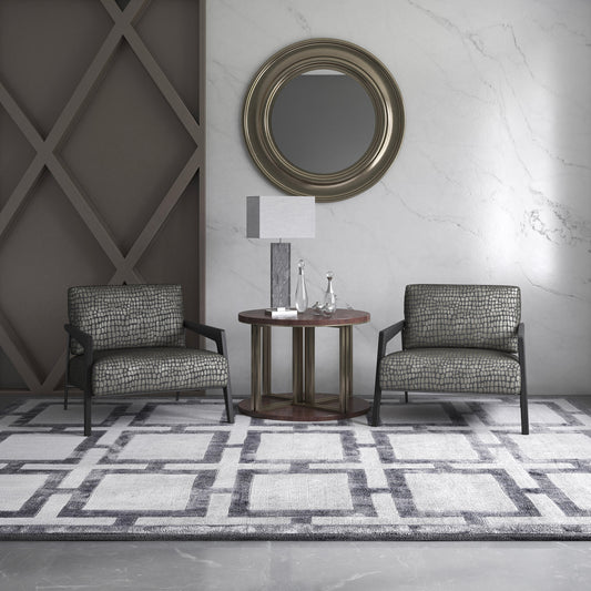 Cazador fabric part of the Sauvage collection shown on 2 chairs