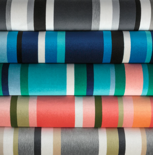south beach stripe outdoor fabric in a stack, charcoal, sapphire, aqua, coral and gilver