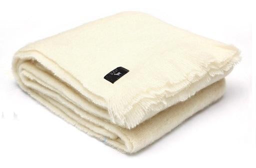 Soft Mohair luxury throws from Glamorous Goat. Mohair throw in Ivory white available at My Sanctuary