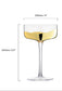 champagne glass with measurements and capacity details on a white background