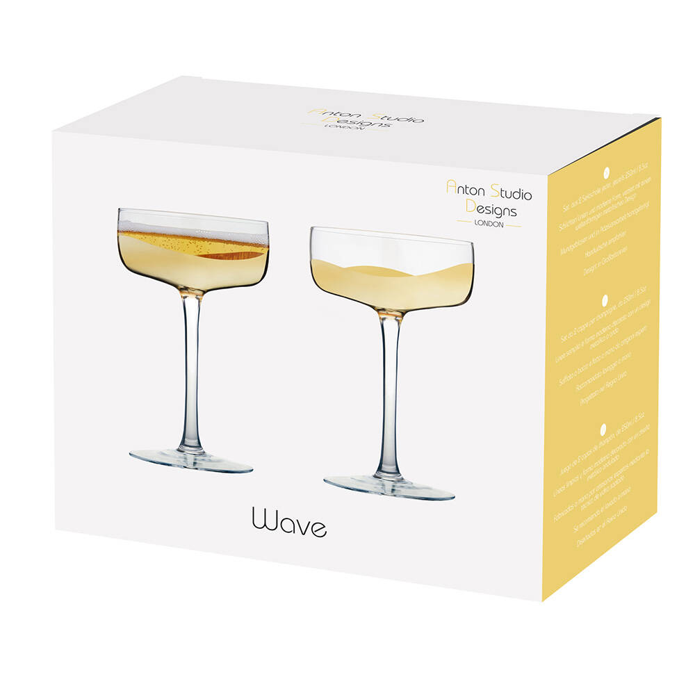 Anton Studio Designs 'Wave' wine glasses in a box with a yellow corner.