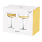 Anton Studio Designs 'Wave' wine glasses in a box with a yellow corner.