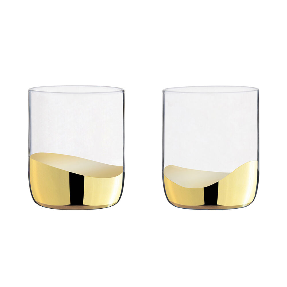 Two clear glasses with gold accents on a white background