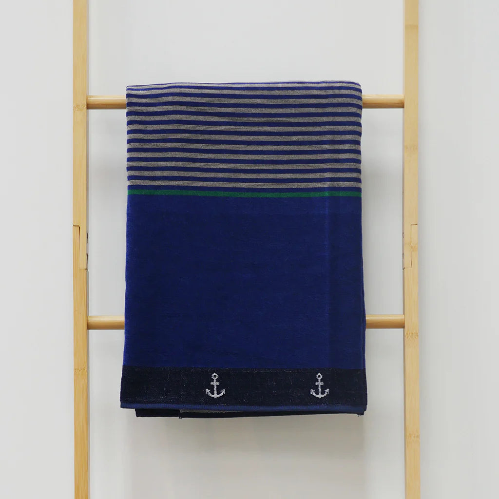 Admiral blue beach towel with stripes and anchor detailing