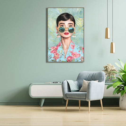 Framed artwork of 
Audrey Hepburn with sunglasses in a living room setting