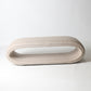 Open oval upholstered bench in cream