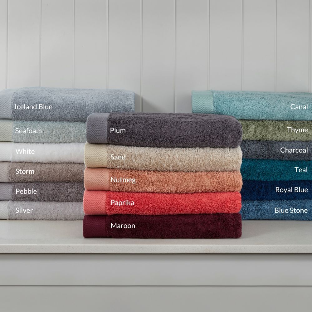 Bamboo Bath Towels in stacks of various colours