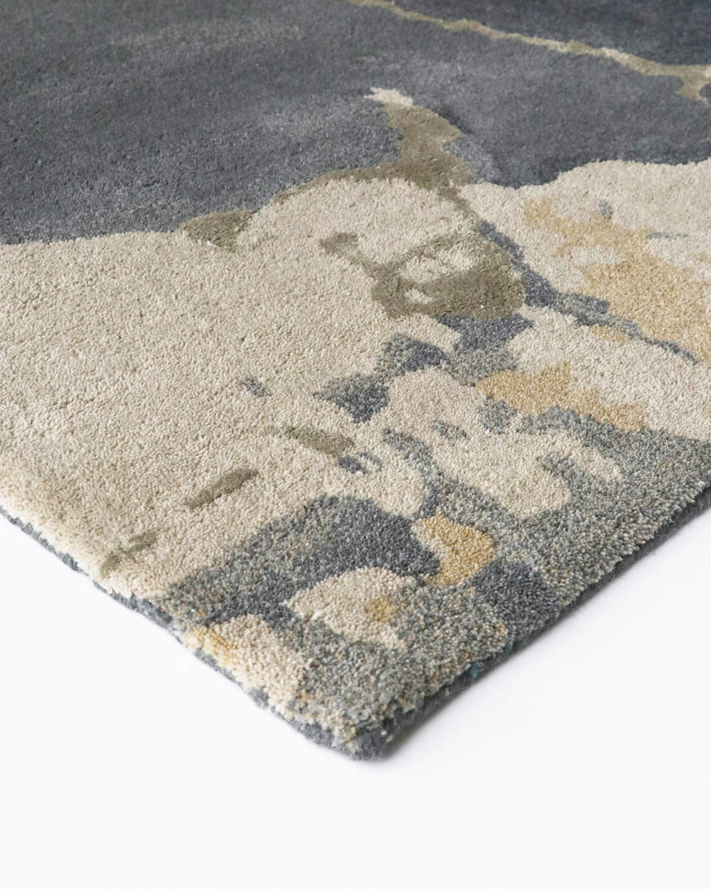 Close-up of a textured rug with geometric pattern on a white background