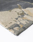 Close-up of a textured rug with geometric pattern on a white background