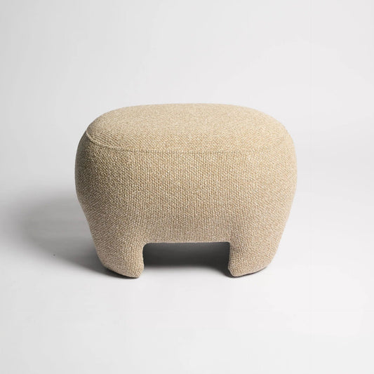 Beige textured ottoman on a white background