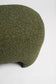 Green textured ottoman on a white background