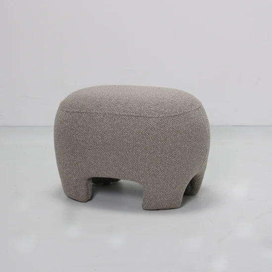 Gray textured ottoman on a white background