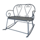 Decorative metal rocking chair with heart-shaped backrest on a white background