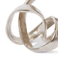 Silver interlocking rings on a white background