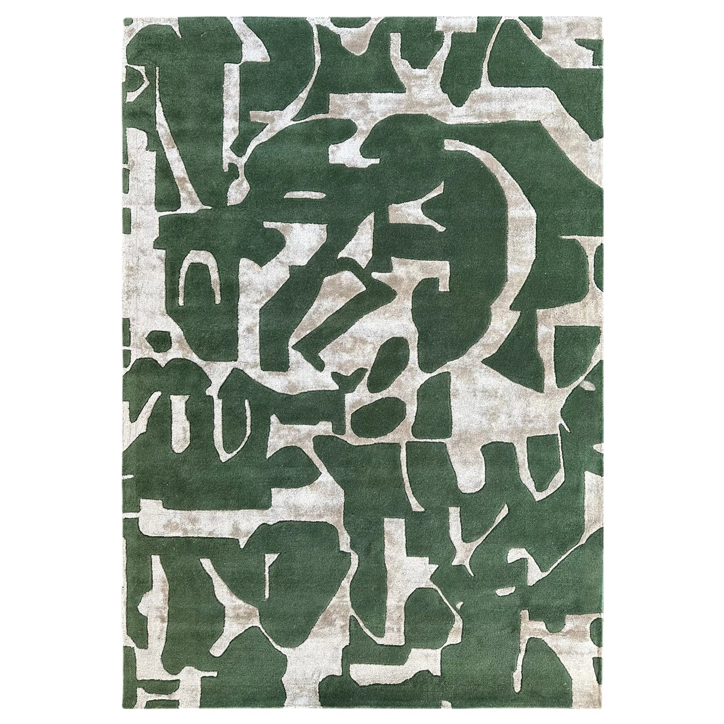 Green and beige abstract patterned rug on a white background