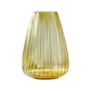 Yellow glass vase with ribbed texture on a white background