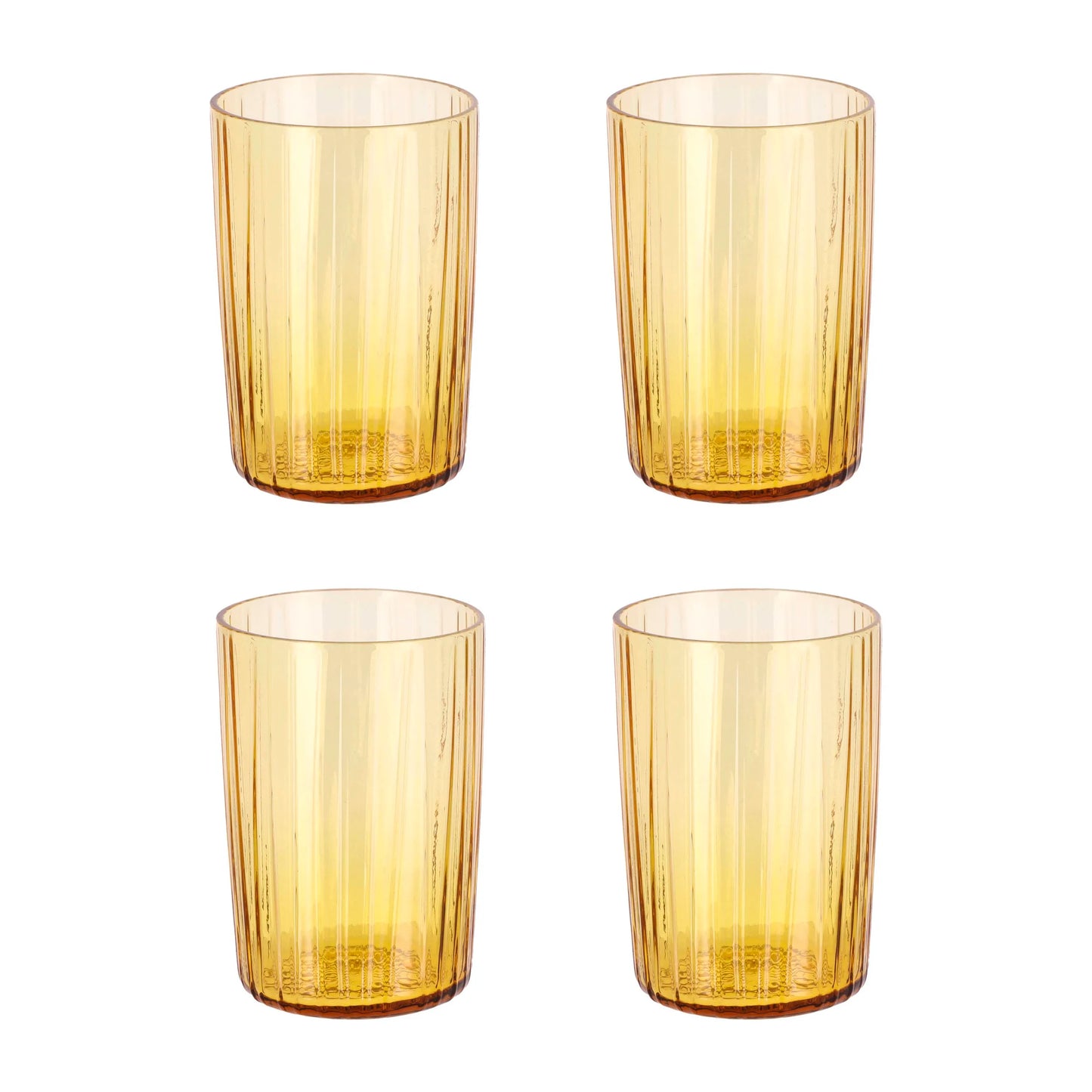 Four amber-colored glass tumblers on a white background