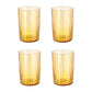 Four amber-colored glass tumblers on a white background