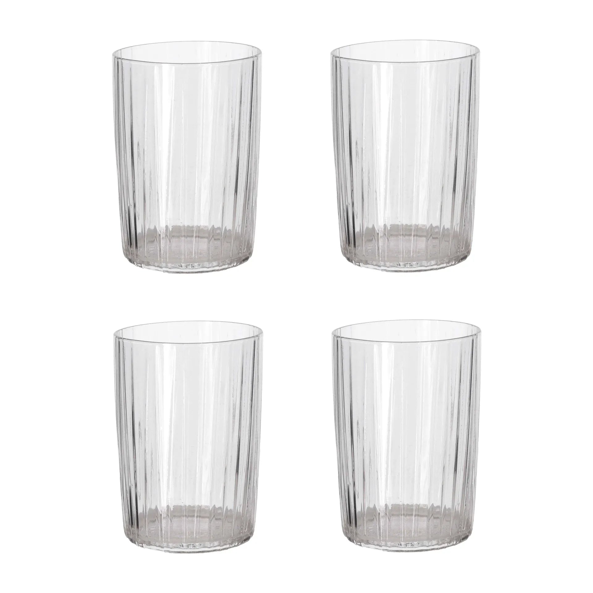 Four clear plastic tumblers on a white background
