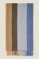 Striped scarf with brown, blue, and beige colors on a beige background