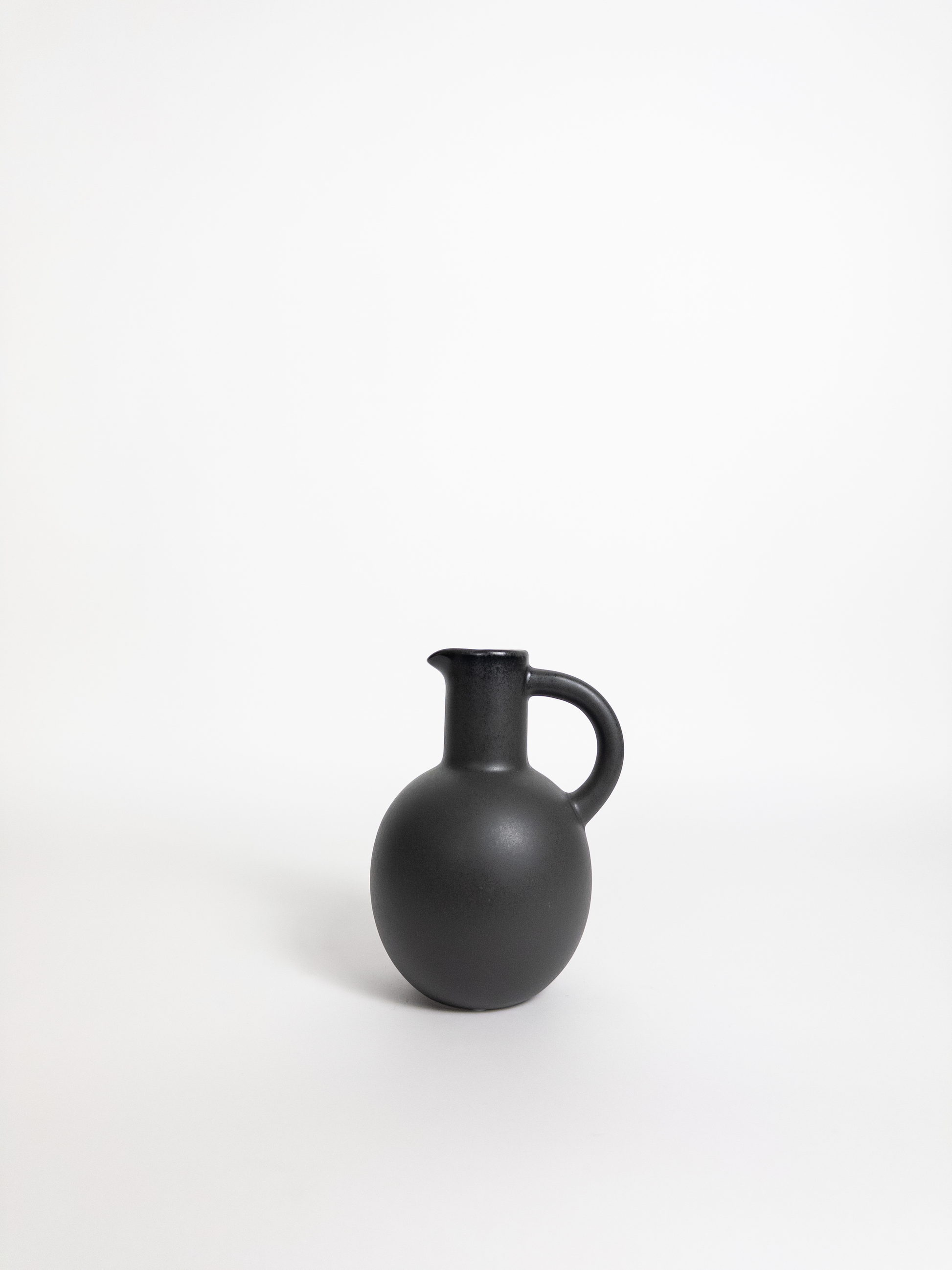 Black handled jug