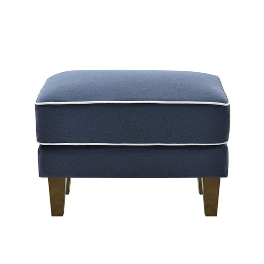 Blue ottoman with white trim on a white background