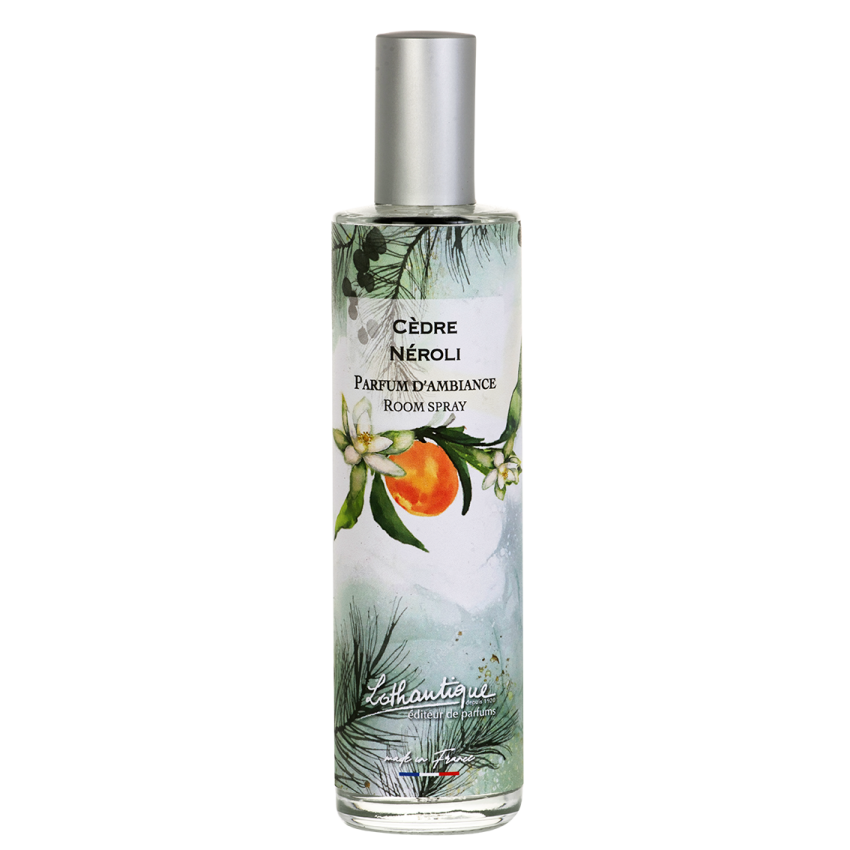 Room spray bottle with a label featuring an orange and green design on a white background