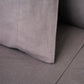 Close-up of a gray flannel pillowcase surface with a subtle texture