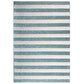 Striped blue and white rug on a white background