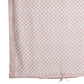 Fabric with a subtle pattern on a white background