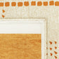 Close-up of a textured surface with orange and beige patterns
