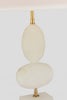 Decorative lamp with two stacked cream-colored alabaster  bowls and gold accents on a light gray background