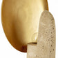 Decorative wall sconce with gold finish and concrete base on a white background