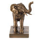 Bronze elephant statue on a white background