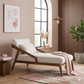 Modern lounge chair in a stylish living room with decor elements.