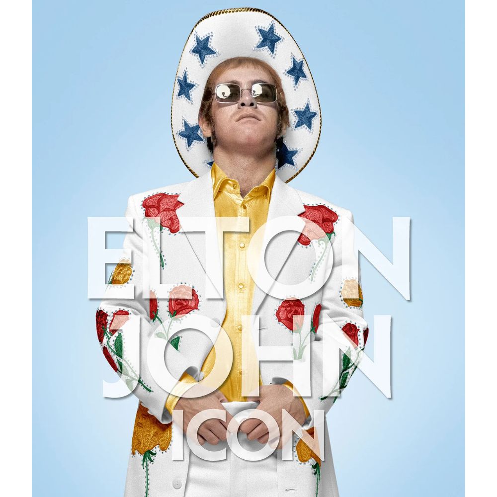 Elton John in a colorful outfit with a sombrero against a light blue background, featuring the text 'Elton John'.