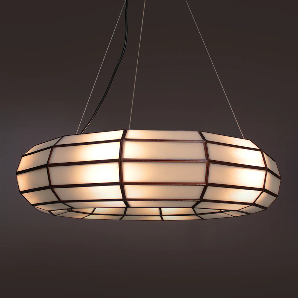 hanging pendant with glass panels framed in bronze