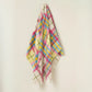 Colourful tartan style wool throw in pink,  yellow, aqua, ivory, rose