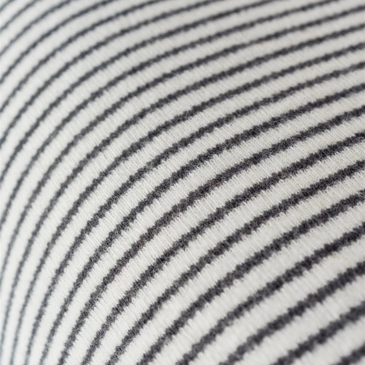 Close-up of black and white striped fabric texture