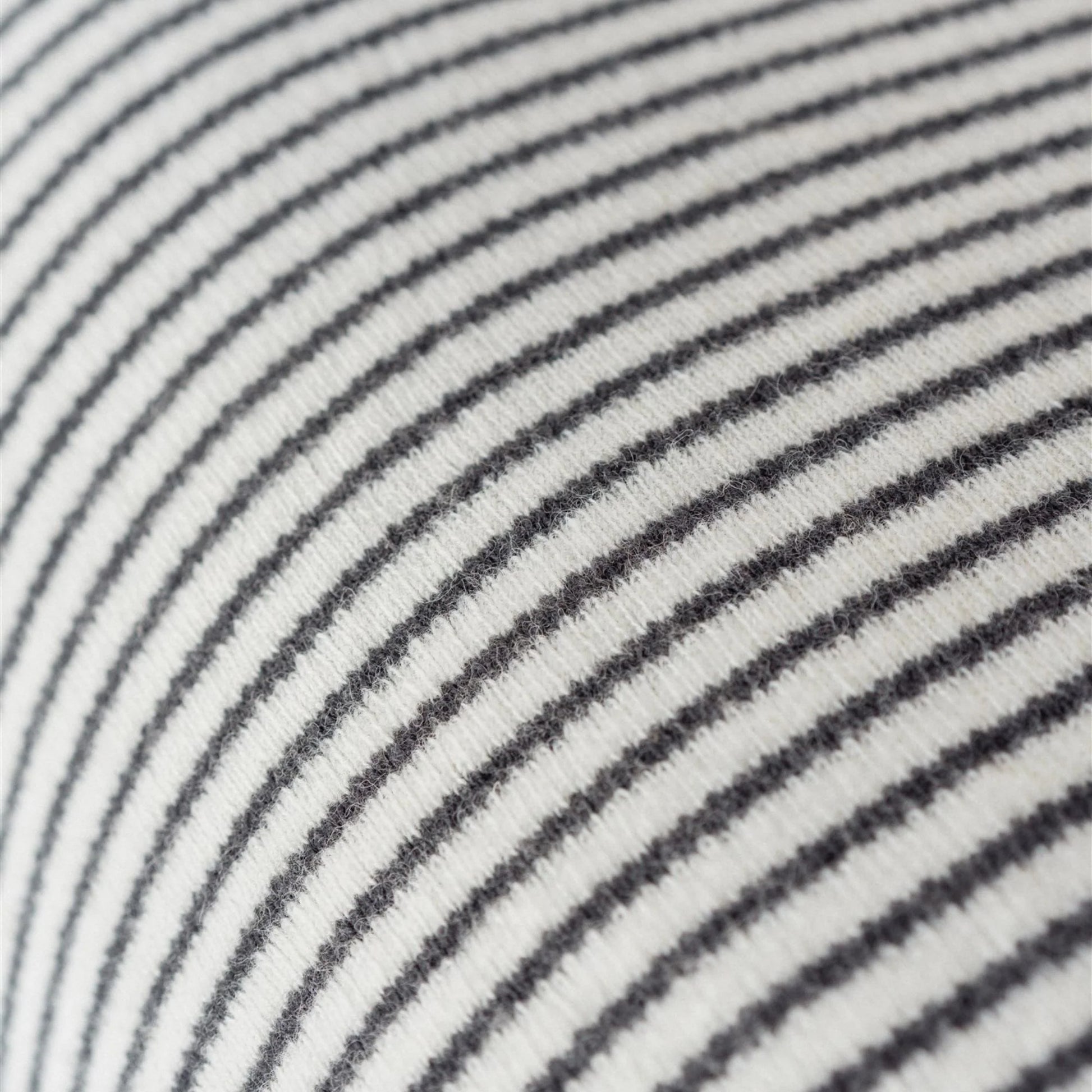 Close-up of black and white striped fabric texture