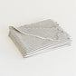 Striped towel with fringes on a white background