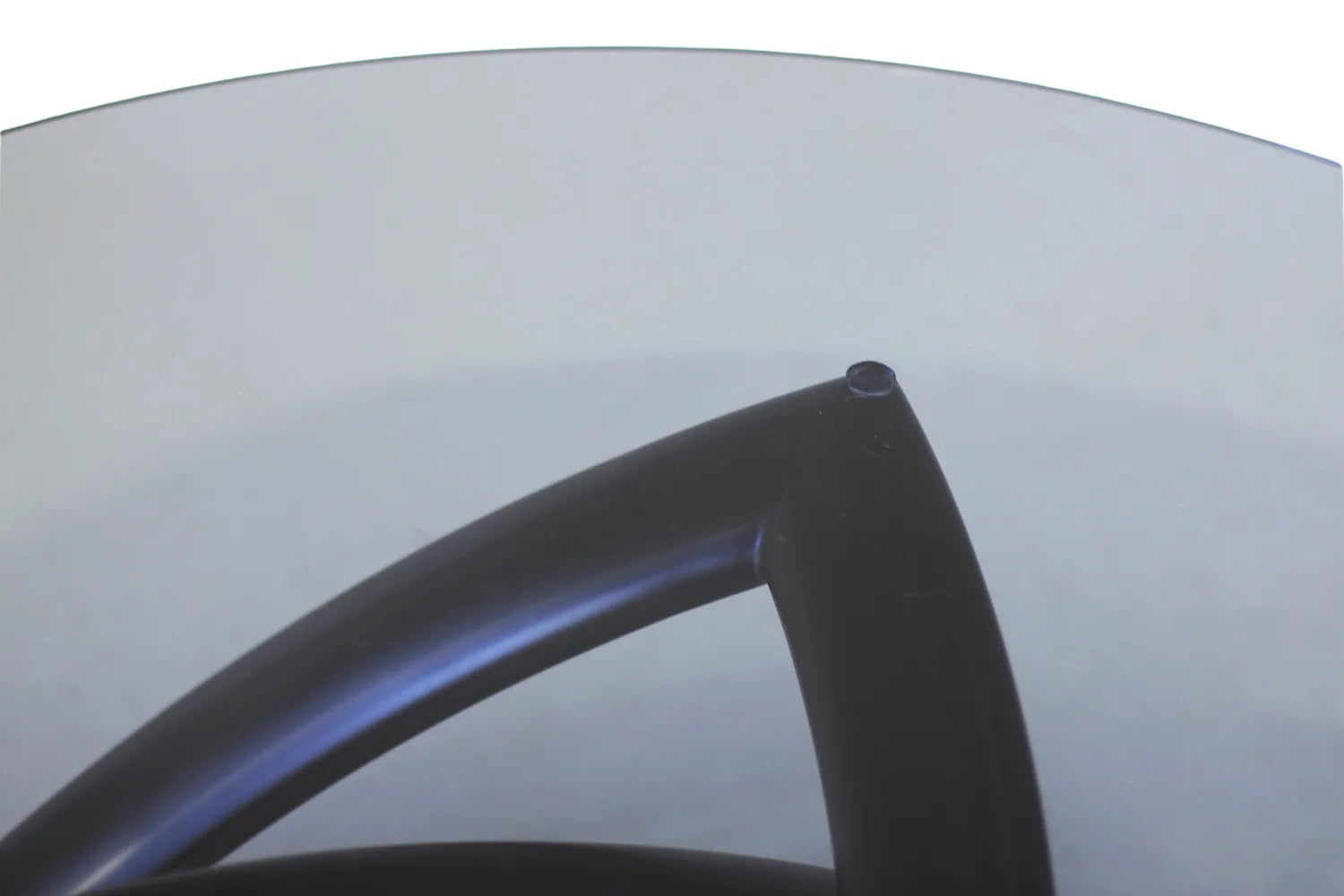 Close up of black glass coffee table