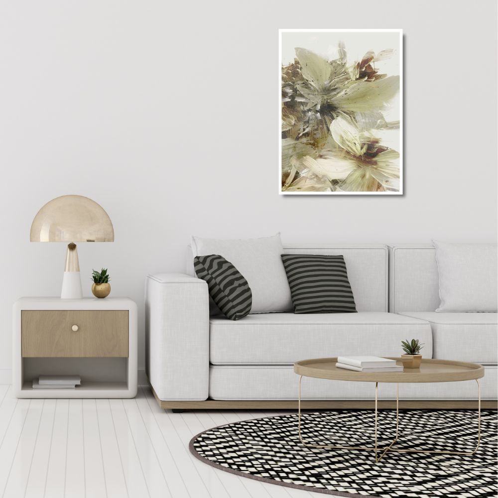 Modern living room with a white sofa, side table, and abstract artwork on the wall.