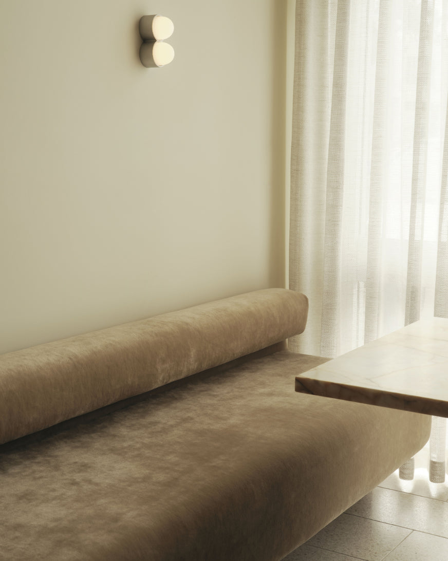 banquet booth seat covered in cream velvet mohair fabric