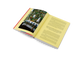 Open book with colorful illustrations and text on a white background