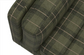 Green plaid fabric on a white background