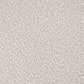 Patterned fabric swatch with a subtle design on a neutral background