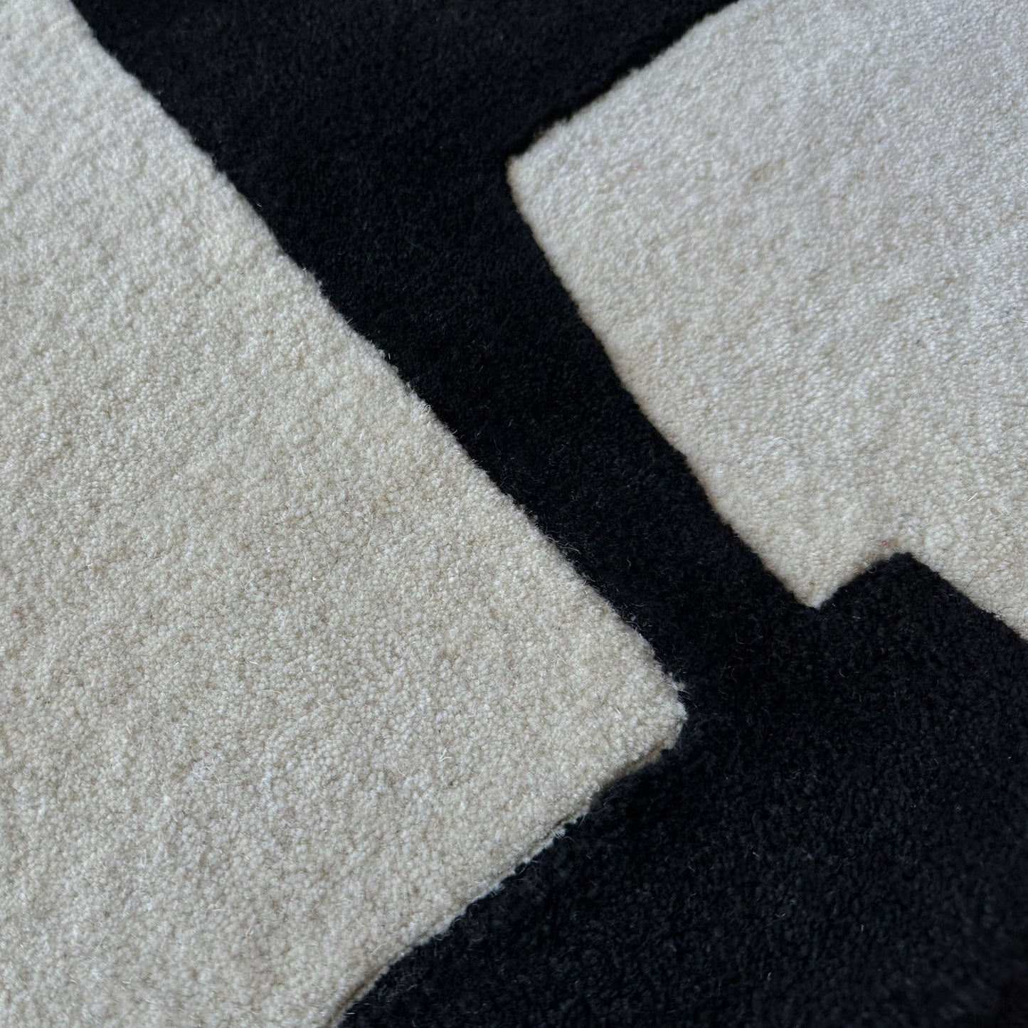 Close-up of a textured surface with black, gray, and white colors.